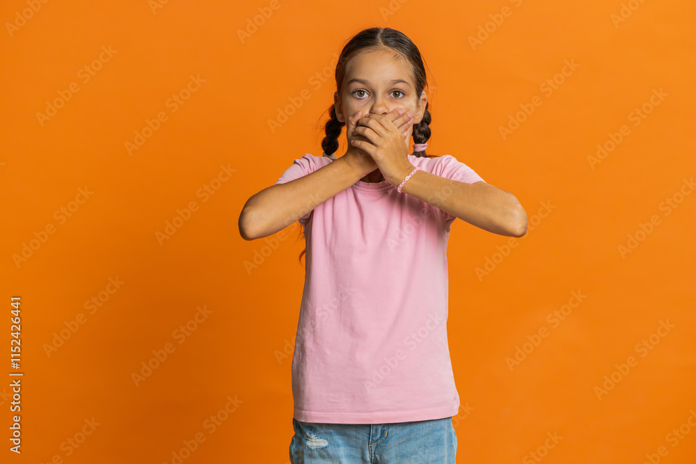 I will not say anything. Frightened strict young preteen child girl kid closing mouth with hands, looking intimidated scared at camera gestures no, refusing to tell terrible secret unbelievable truth. I will not say anything. Frightened strict young preteen child girl kid closing mouth with hands, looking intimidated scared at camera gestures no, refusing to tell terrible secret unbelievable truth.