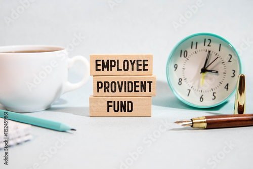 Wooden blocks with the inscription Employees' Provident Fund. photo