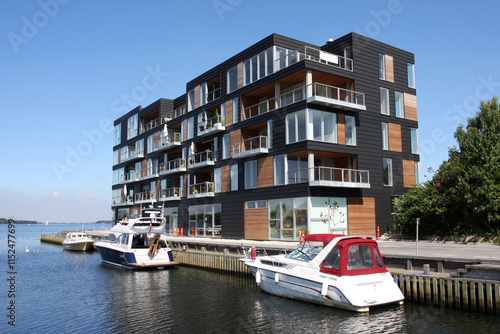 A modern scandinavian house with own jetty, taken in Nykøbing Falster, Denmark photo