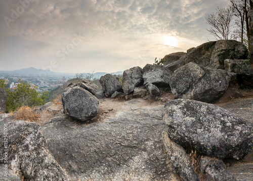 Sunset view of the distant Hua Hin coastline, from a popular mountain view destination,Hua Hin,Thailand. photo