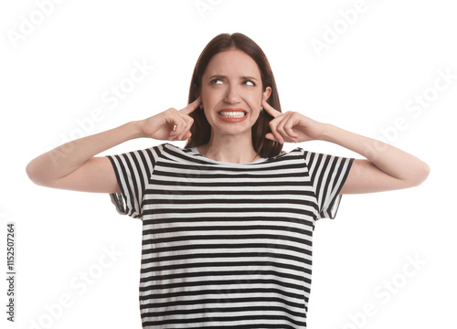 Woman covering her ears with fingers on white background photo