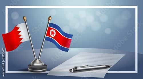 Bahrain and North Korea National flags on small table with bokeh background, cooperative relationship