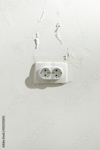 Saltpeter or mold on the wall, Closeup of wall stained with water infiltration. Potassium nitrate, which is present in the building materials comes into contact with oxygen and creates excess moisture photo