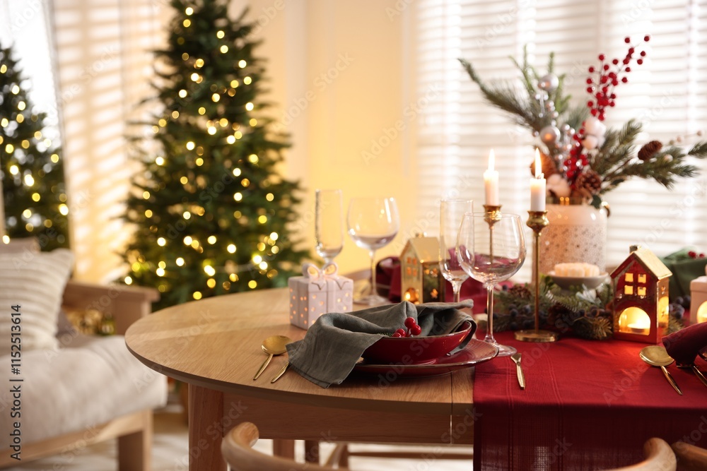 Christmas table setting with stylish dishware and festive decor indoors Christmas table setting with stylish dishware and festive decor indoors