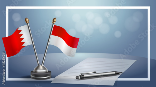 Bahrain and Monaco National flags on small table with bokeh background, cooperative relationship