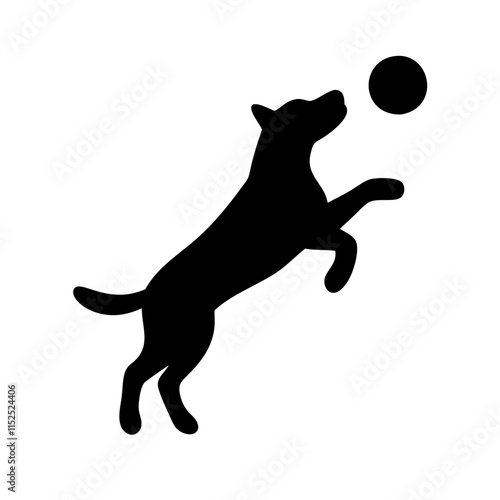 Dog jumping to catch a ball