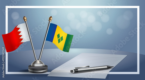 Bahrain and ST. Vincent Grenadines National flags on small table with bokeh background, cooperative relationship