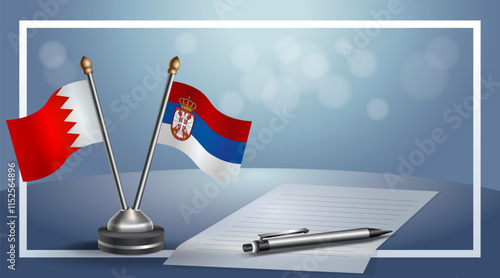 Bahrain and Serbia National flags on small table with bokeh background, cooperative relationship