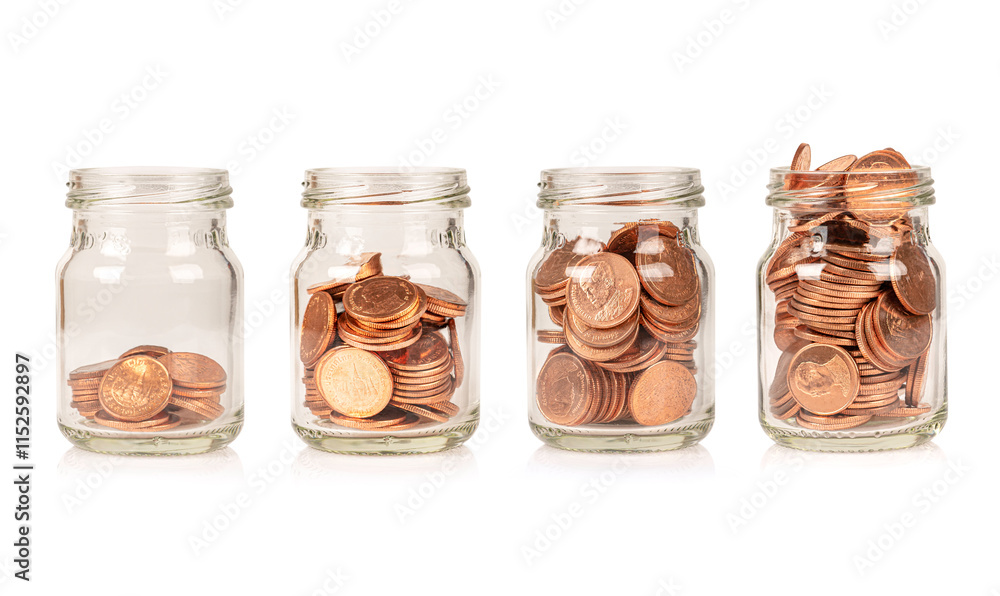 Saving money concept. Set of coin in glass jar isolated on white background. Saving money concept. Set of coin in glass jar isolated on white background.