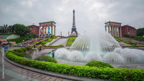 SHENZHEN, CHINA - NOVEMBER 7, 2024: People enjoy a sunny day at a park featuring replicas of famous landmarks