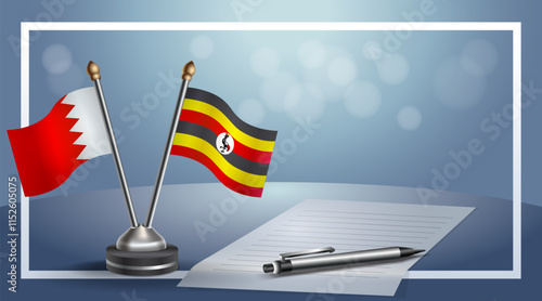 Bahrain and Uganda National flags on small table with bokeh background, cooperative relationship