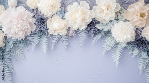 Pastel-colored artificial flowers and ferns arranged on a lavender background, leaving a blank space in the center.