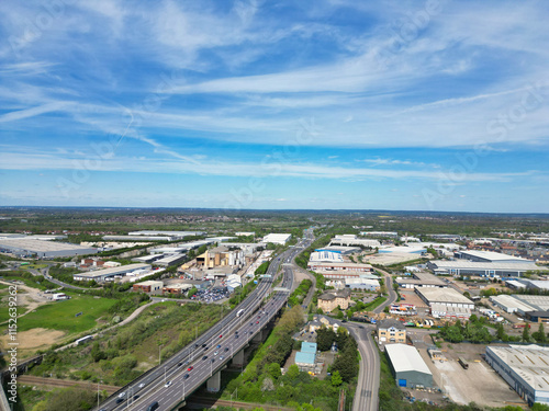 High Angle View of Dartford City of River Thames Dartford Channel Bridge Crossing, Estuary, Thurrock in Essex, England United Kingdom. Aerial Footage Captured with Drone's Camera on April 14th, 2024 photo