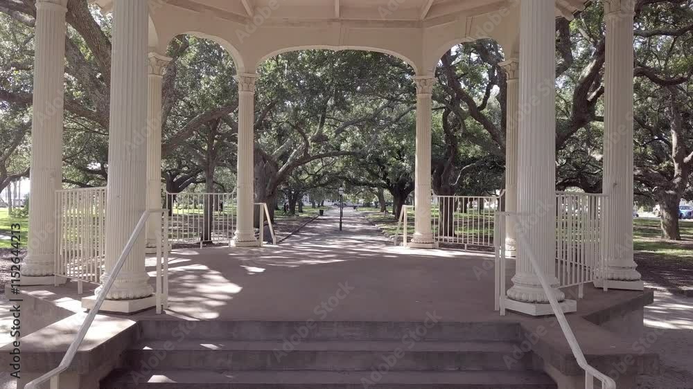 View moving through the famous gazebo in White Point Gardens in the Battery in downtown Charleston, South Carolina. View moving through the famous gazebo in White Point Gardens in the Battery in downtown Charleston, South Carolina.