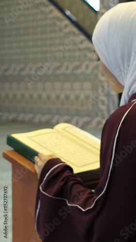 Reading Quran on Lectern photo