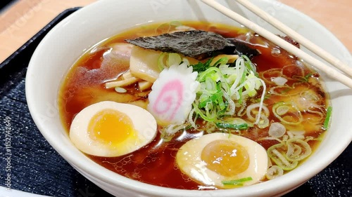 4K Traditional Japanese soy sauce ramen with egg bowl.