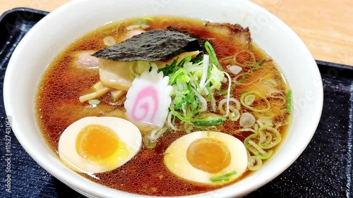 4K Traditional Japanese soy sauce ramen with egg bowl.