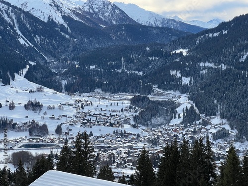 A fairytale winter atmosphere and a magnificent panorama on the mountine Swiss tourist resort of Klosters - Canton of Grisons, Switzerland (Kanton Graubünden, Schweiz) photo