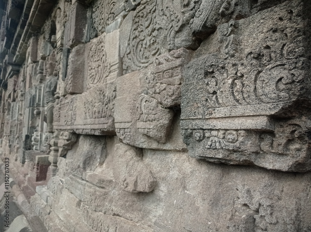 carved statues at Plaosan temple site, Prambanan, Central Java, Indonesia carved statues at Plaosan temple site, Prambanan, Central Java, Indonesia