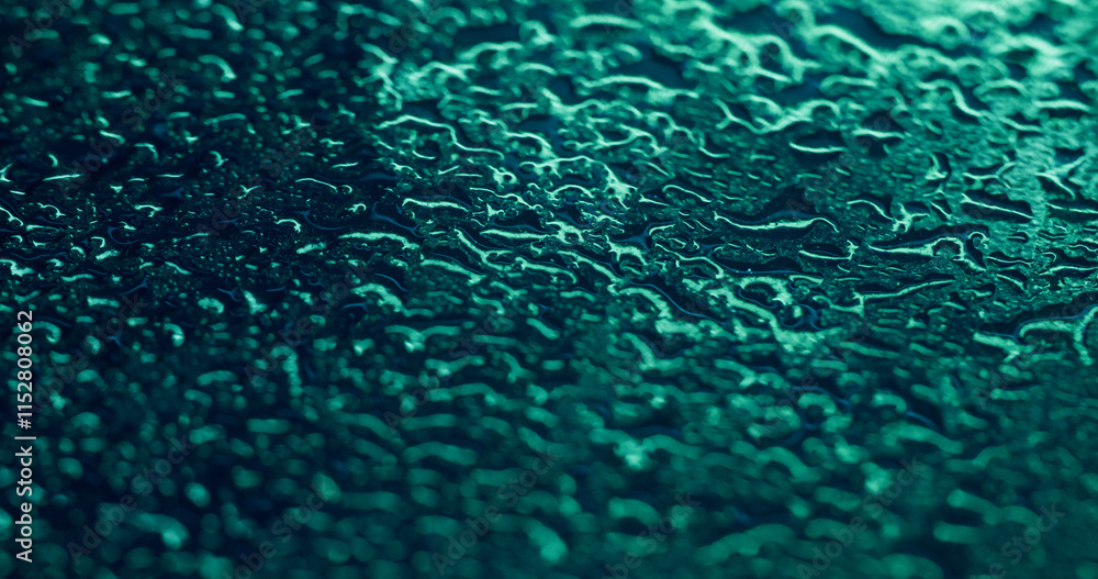 Rainy texture. Liquid drops. Sparkling colorful blue fluid water blob gleaming blinking moisture on abstract bokeh light art background. Rainy texture. Liquid drops. Sparkling colorful blue fluid water blob gleaming blinking moisture on abstract bokeh light art background.