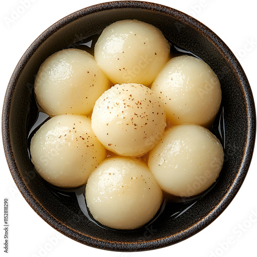 Top view of an extremely perfect looking Rasgulla in a dark cup isolated on a white transparent background photo