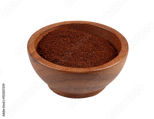 Ground coffee in a wooden cup