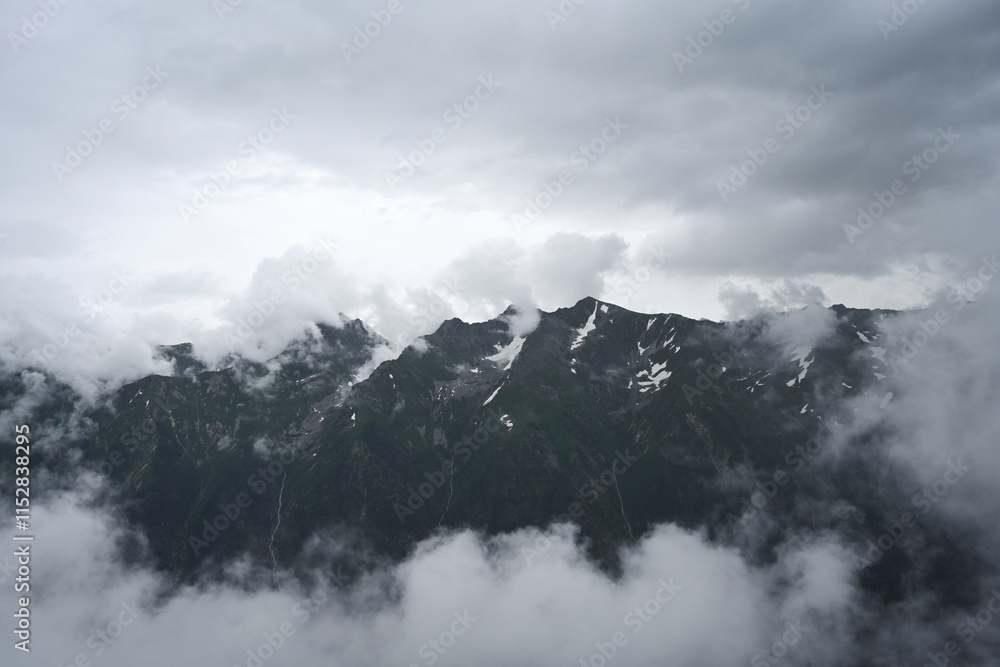 Cloudy landscape of the mountain range from Sofia Saddle Pass Cloudy landscape of the mountain range from Sofia Saddle Pass