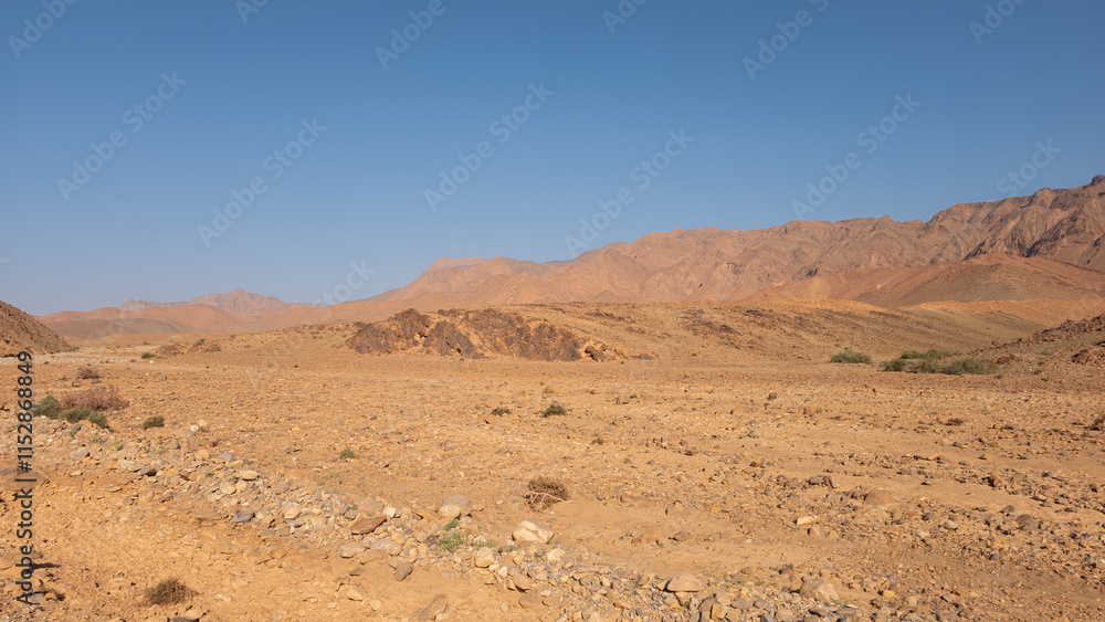 Desert valley in the Moroccan countryside near the Atlas Mountains Desert valley in the Moroccan countryside near the Atlas Mountains