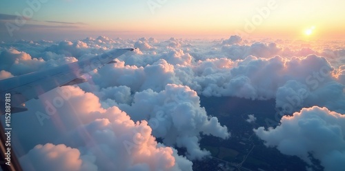 Wallpaper Mural Cloudy veil shrouds the landscape below as plane flies high, high, window, elevated Torontodigital.ca