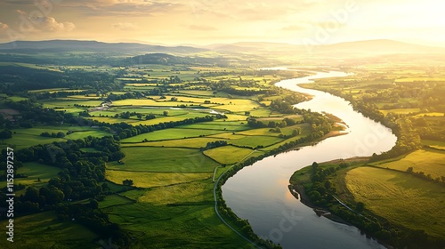 Wallpaper Mural Serene River Landscape Aerial View of Rolling Hills Green Fields and Winding River at Sunset Torontodigital.ca