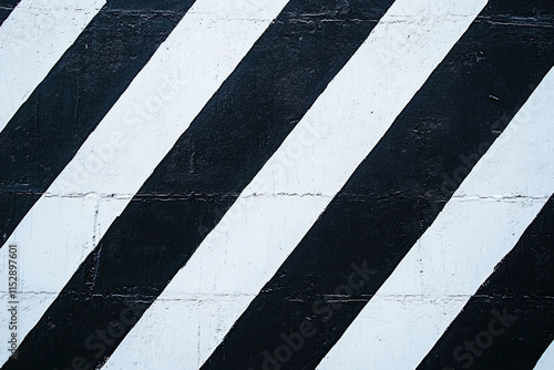 Minimalistic black and white striped pattern creating a bold backdrop