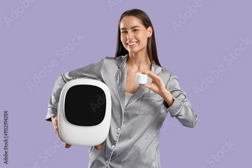 Happy young woman with smal...