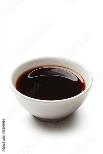 Soy sauce on white background photo