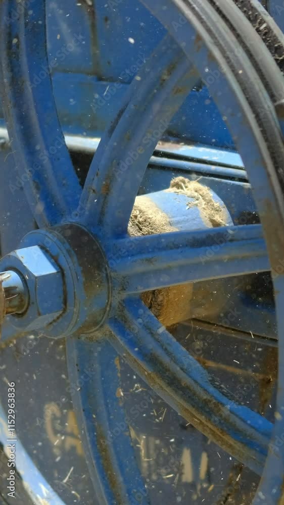 Spinning wheel attached to tractor Spinning wheel attached to tractor