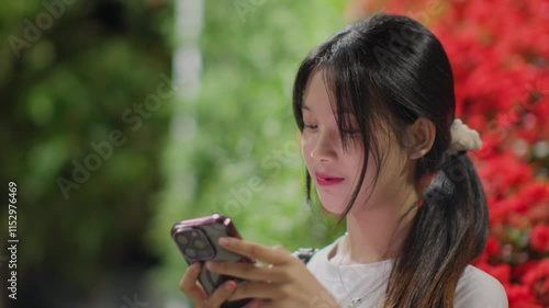 Woman using smartphone at night, Night lights, Bokeh of lights.