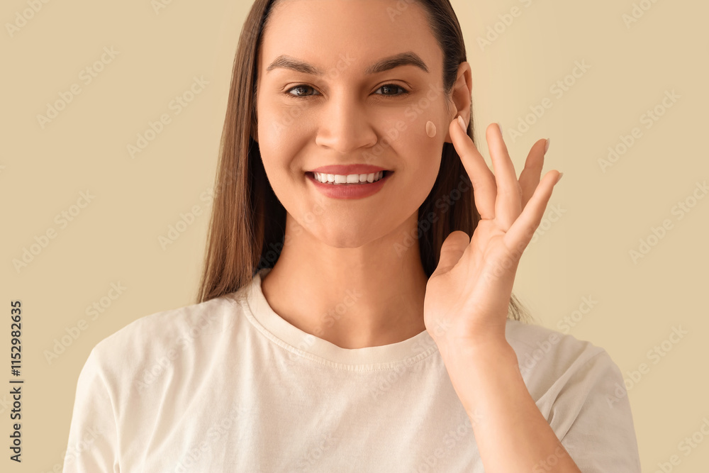 Young woman with pimple patch on beige background, closeup Young woman with pimple patch on beige background, closeup