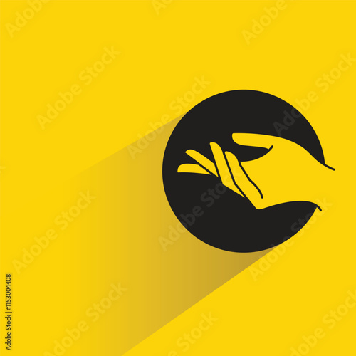 begging hand gesture with shadow on yellow background