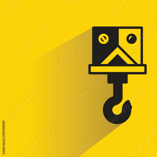 crane hook with shadow on yellow background