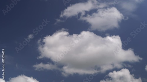 Clouds and waves on a clear day