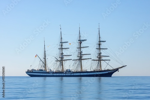 A majestic tall ship sailing on calm waters. photo