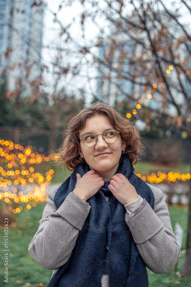 Portrait of a young woman in a big city. Woman in the city. Portrait of a young woman in a big city. Woman in the city.