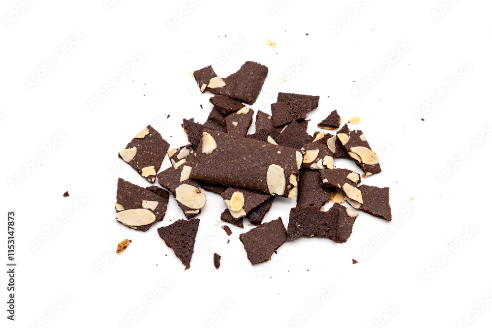 Crispy cracker snack are broken into small pieces. A pile of brittle brownie with almond nut isolated on white background. Crispy cracker snack are broken into small pieces. A pile of brittle brownie with almond nut isolated on white background.