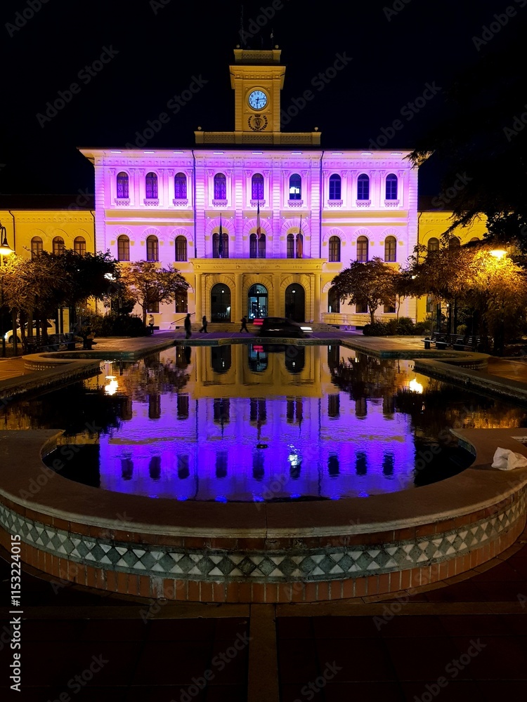 Naklejka premium Night view of the Palacio de Espana in Seville, Spain