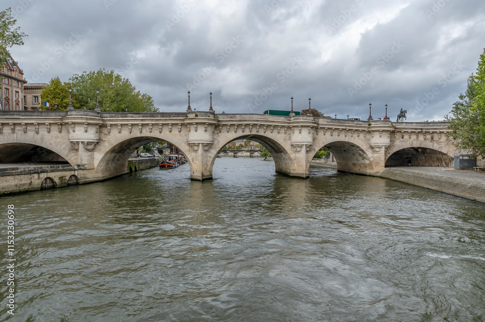Pont Neuf is, despite its name, the oldest existing bridge in Paris, France. It crosses the Seine River. Pont Neuf is, despite its name, the oldest existing bridge in Paris, France. It crosses the Seine River.