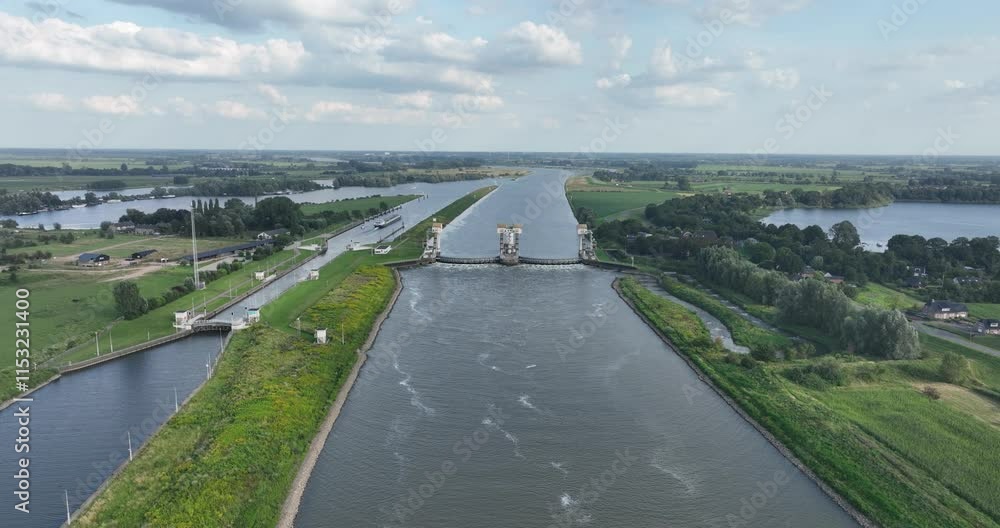 Aerial view of Hagestein weir and lock complex near Hagestein village. Hydroelectric power plant Aerial view of Hagestein weir and lock complex near Hagestein village. Hydroelectric power plant
