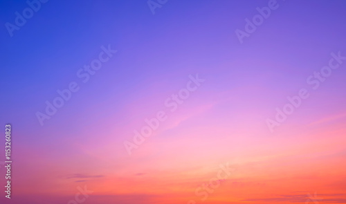 Fototapeta Naklejka Na Ścianę i Meble -  Evening romantic sky background with colorful pink orange natural gradient light and thin cloud on blue romantic twilight sky after sundown