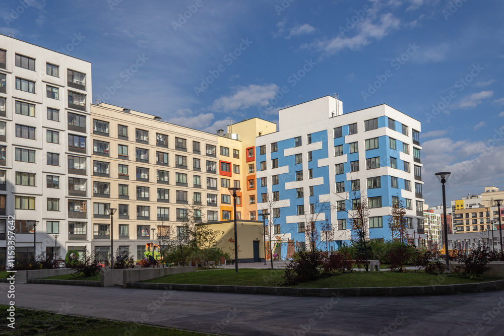 Modern apartment building with colorful facades on the outskirts of the city. Residential Complex 'In the forest', Moscow, Russia Modern apartment building with colorful facades on the outskirts of the city. Residential Complex 'In the forest', Moscow, Russia