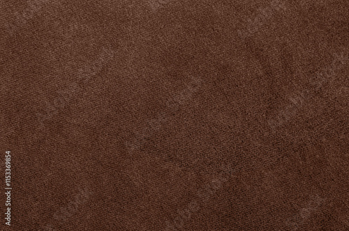 Close-up of soft velour fabric texture in Pantone 2025 color Mocha Mousse. photo