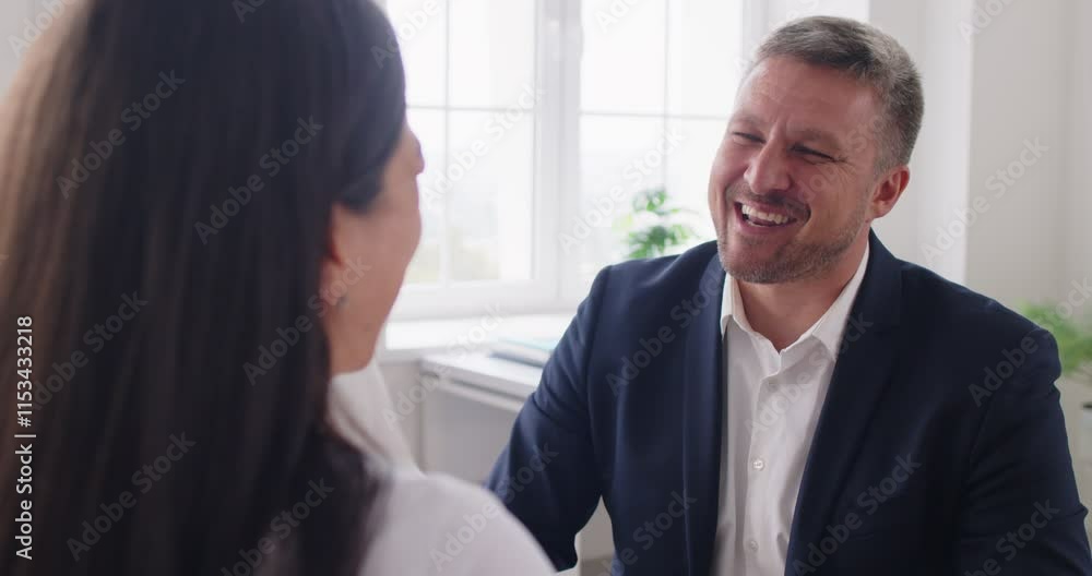 Business people celebrates success in the office by giving high fives. The moment captures their excitement, teamwork, and mutual agreement on achieving a victory, highlighting a strong work. Business people celebrates success in the office by giving high fives. The moment captures their excitement, teamwork, and mutual agreement on achieving a victory, highlighting a strong work.