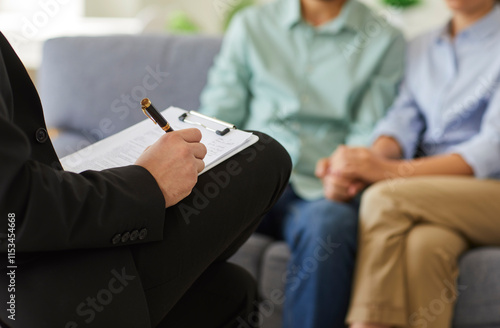 Obraz na plátne Close up captures the hands of a psychologist during a family therapy session